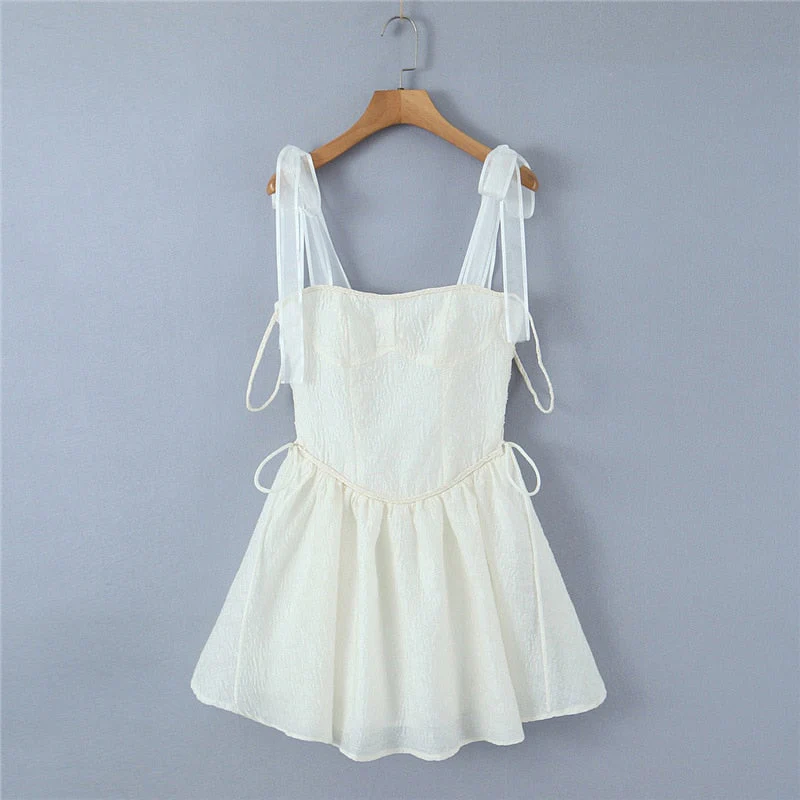 Hulianfu White Strap Dress 2026  Spring Summer New Sexy Holiday Fashion Slim Waist Hollow Tie Short Mini Dress For Women - Deanwangkt