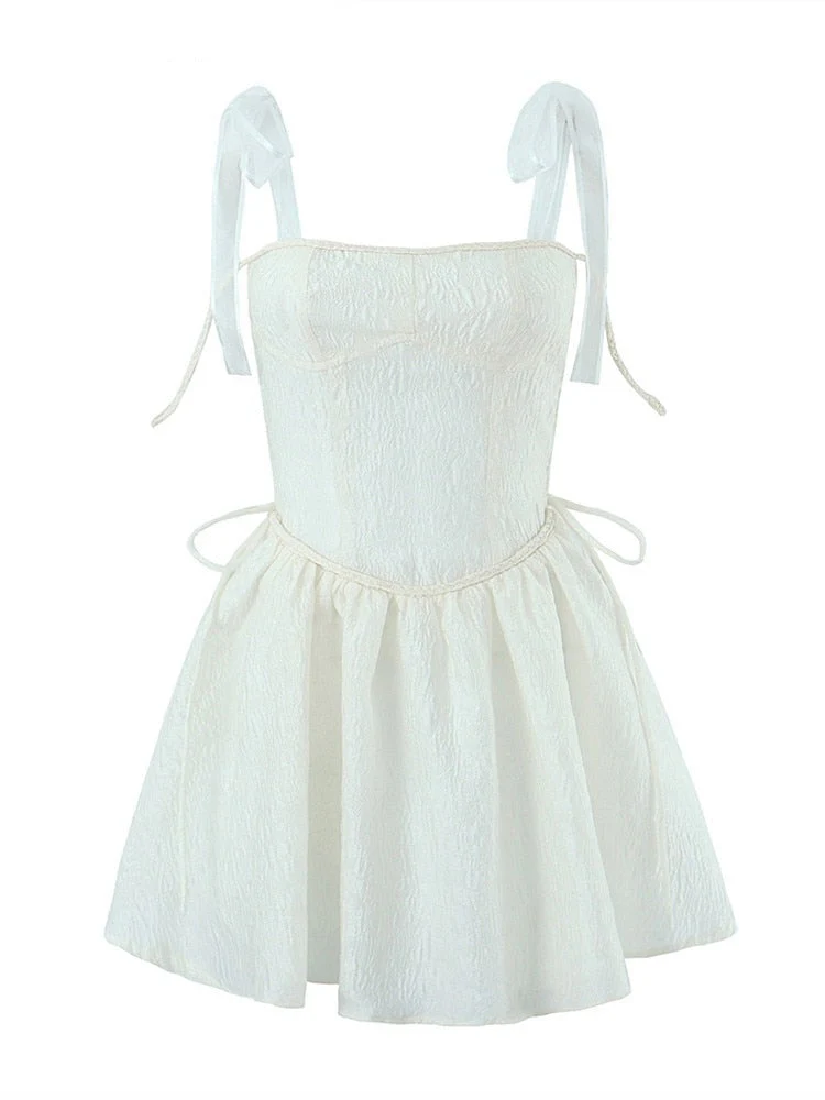 Hulianfu White Strap Dress 2026  Spring Summer New Sexy Holiday Fashion Slim Waist Hollow Tie Short Mini Dress For Women - Deanwangkt