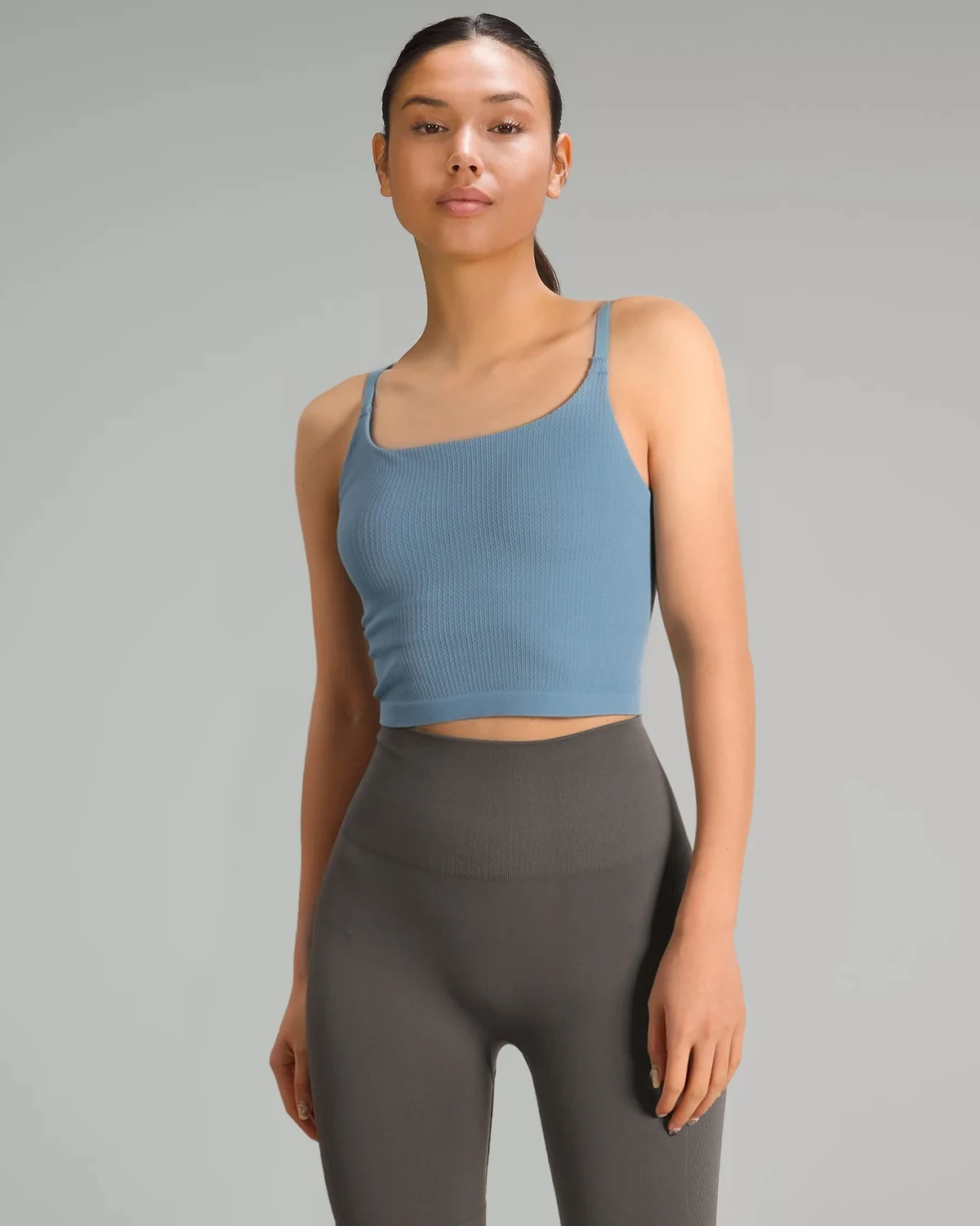 Thin-strap one-piece cup sports bra cami for women, fitness shaping bra with Lycra-soft stretch, suitable for layering or wearing on its own as a layering tank
