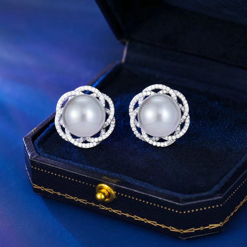 2025 S925 silver needle light luxury fashion elegant temperament earrings women's high-end design sense three-dimensional hollow flower pearl stud earrings - Deanwangkt