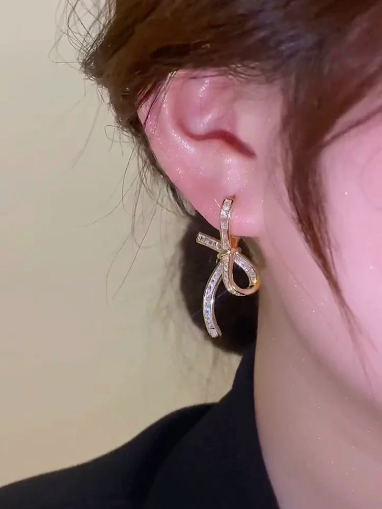 High-end light luxury zircon bow earrings, women's personality design earrings, sweet versatile ear jewelry - Deanwangkt