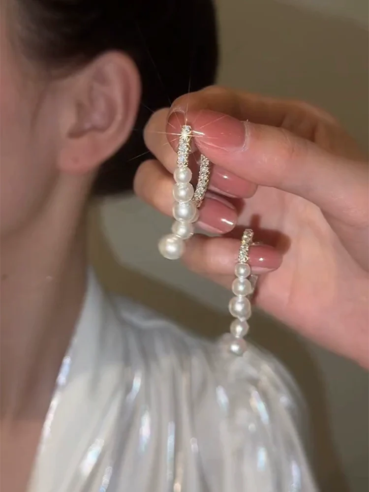 Silver needle crossed pearl diamond earrings women's exquisite light luxury high-end stud earrings niche design temperament versatile earrings - Deanwangkt