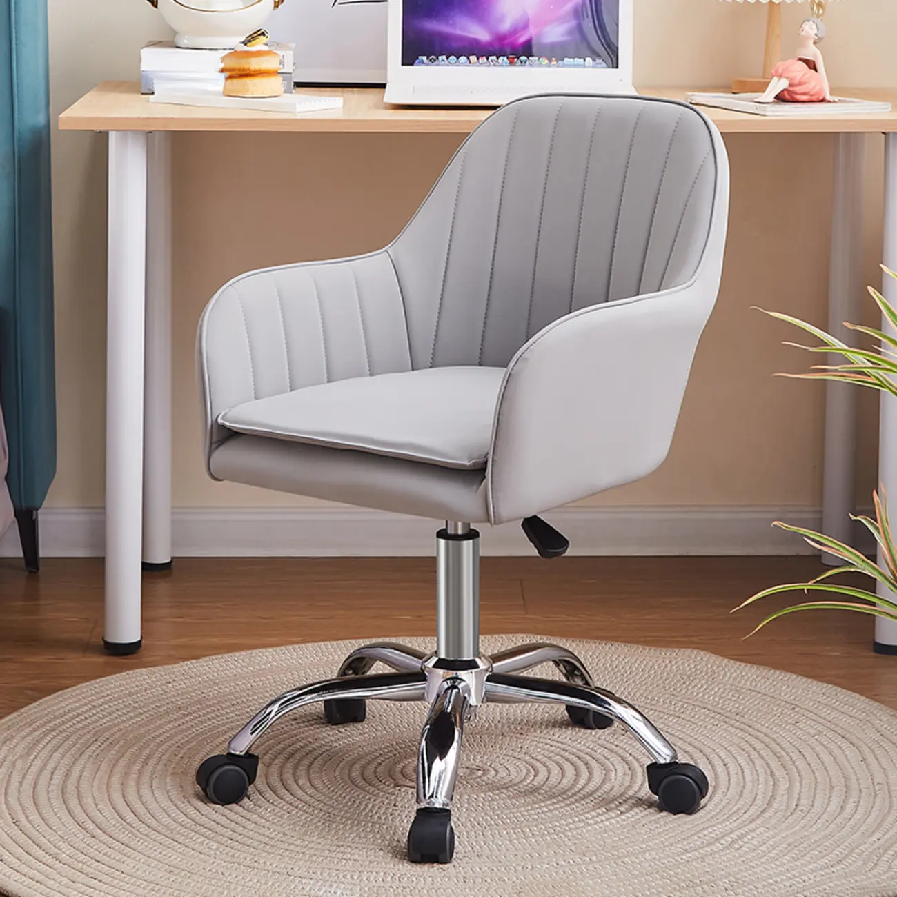 Sleek Grey Leather Swivel Office Chair