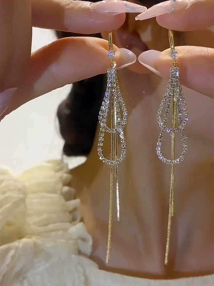 Temperament light luxury high-end flash diamond water drop fringed earrings women's new trendy niche design long thin earrings - Deanwangkt