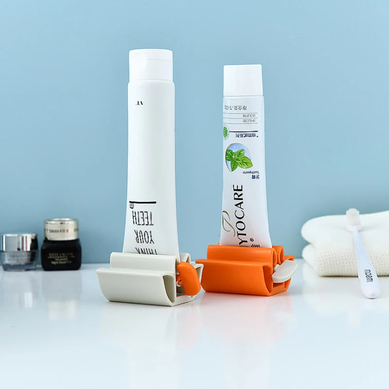 HULIANFU Rolling Toothpaste Device Tube Dispenser Holder Multifunctional Plastic Facial Cleanser Squeezer Press for Bathroom Accessories - Deanwangkt
