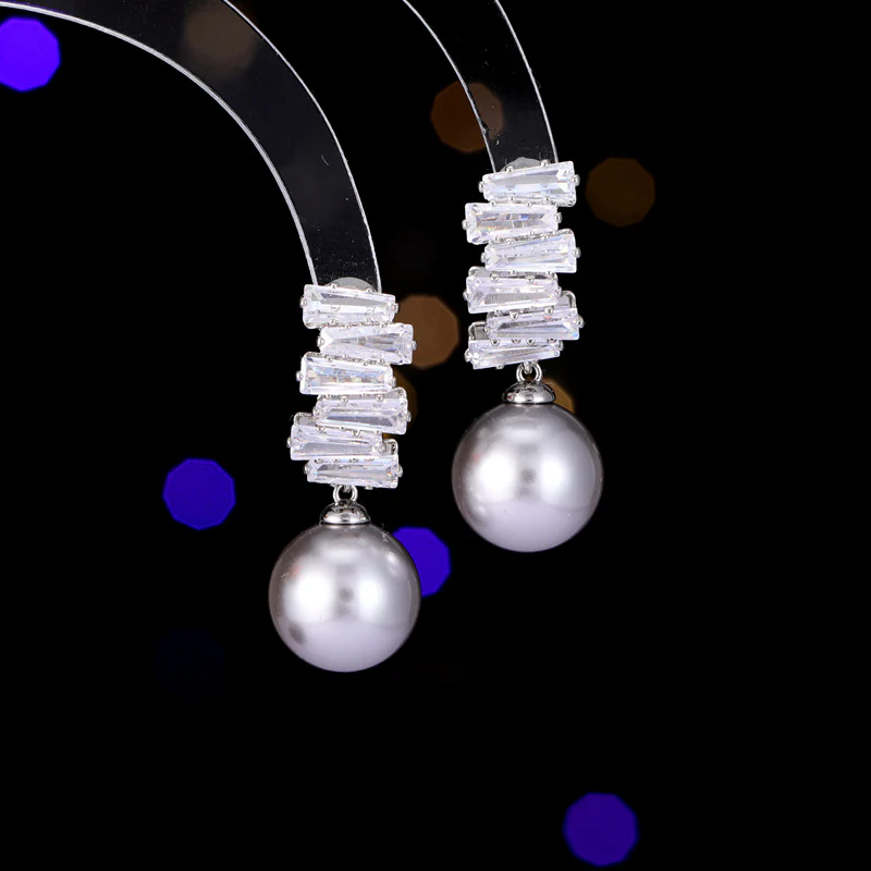 2025 New  retro fashion earrings women's light luxury niche high-end super personalized design flash zircon pearl earrings - Deanwangkt