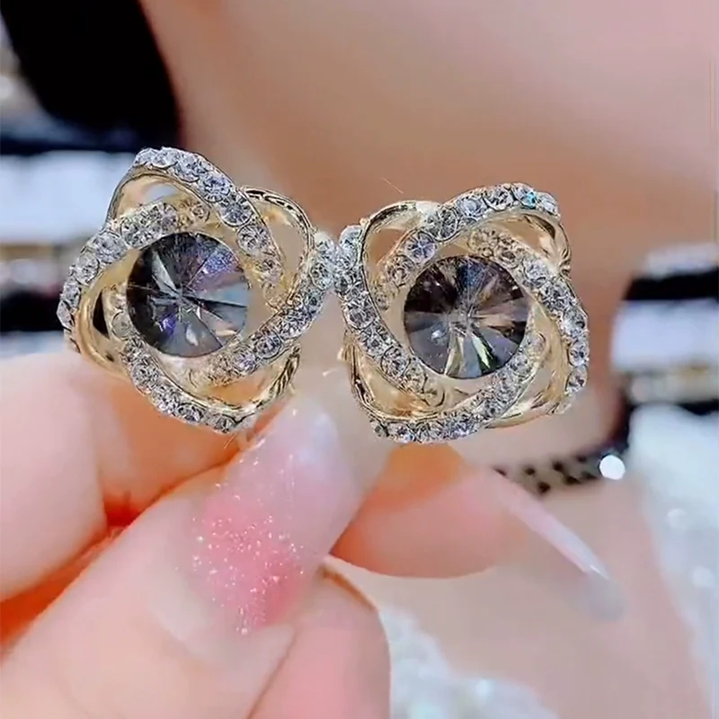 Gray zircon winding earrings, feminine temperament, light luxury, high-end silver needle earrings, popular Popular style ear jewelry in - Deanwangkt
