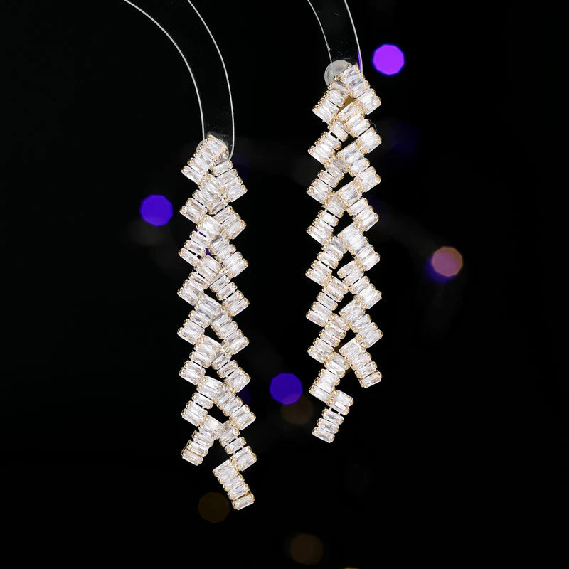 2025 Luxury exaggerated earrings design sense geometric wavy zircon inlaid long banquet dress with earrings wholesale - Deanwangkt