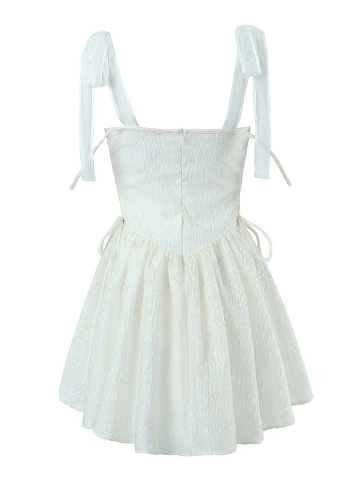 Hulianfu White Strap Dress 2026  Spring Summer New Sexy Holiday Fashion Slim Waist Hollow Tie Short Mini Dress For Women - Deanwangkt