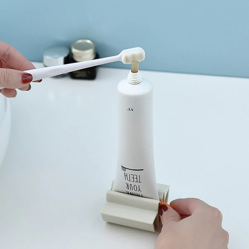 HULIANFU Rolling Toothpaste Device Tube Dispenser Holder Multifunctional Plastic Facial Cleanser Squeezer Press for Bathroom Accessories - Deanwangkt