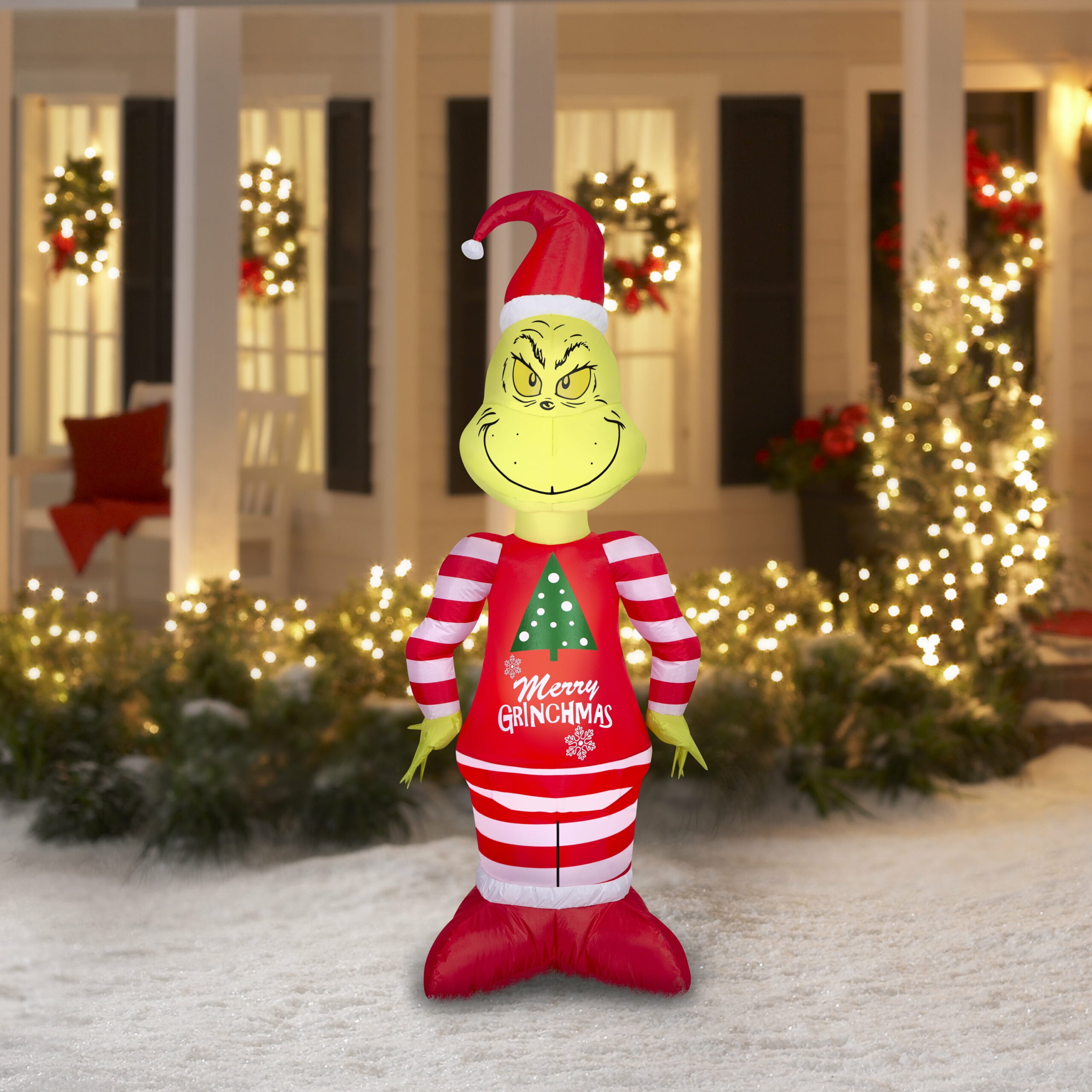 Dr. Seuss 5.5 ft Grinch in Pajamas Airblown Inflatable with LED Lights for Yard Decoration