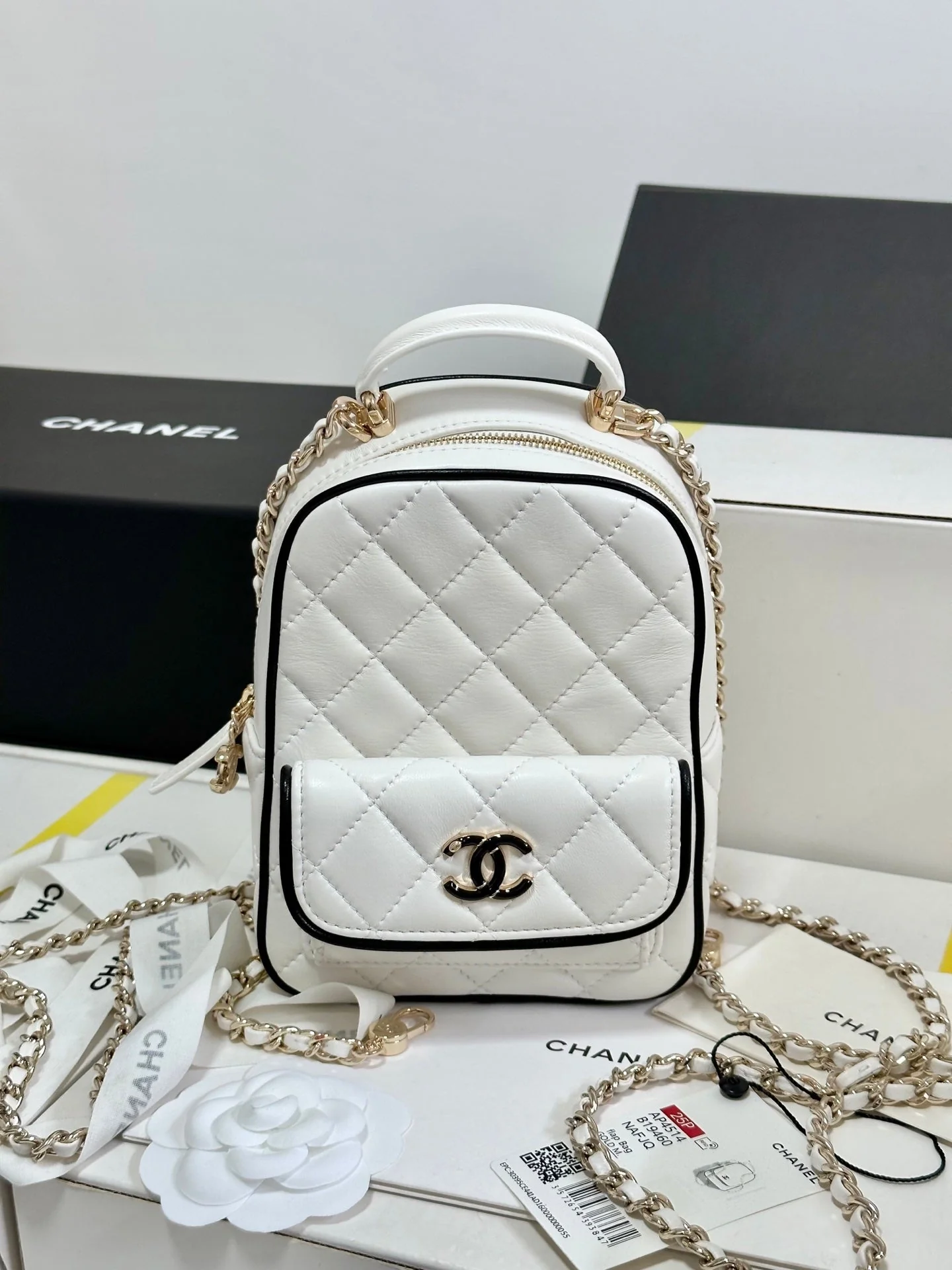 CHANEL 25P Mini Backpack 18 White Black Lambskin Gold Hardware 243521