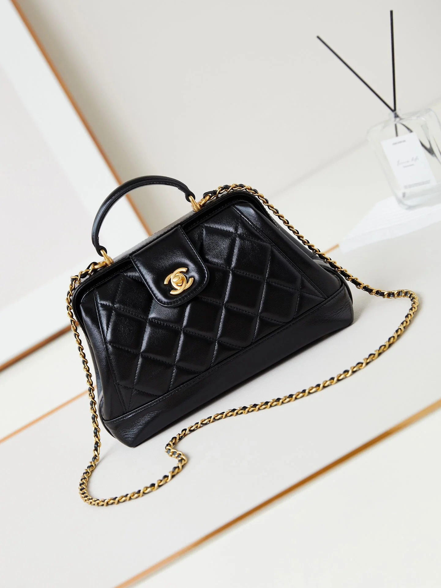 CHANEL 24A Top Handle 23.5cm Black Wax Leather Gold Hardware 238469
