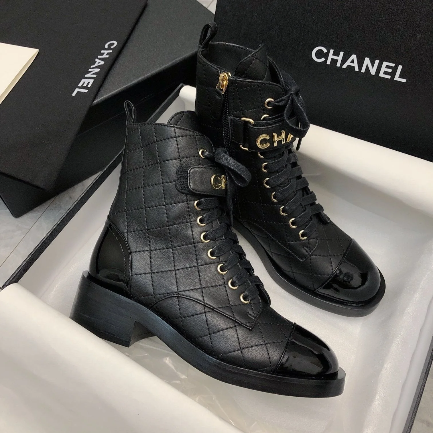 CHANEL Short Boots 45mm In Black Quilted Lambskin And Glossy Cowhide 950042