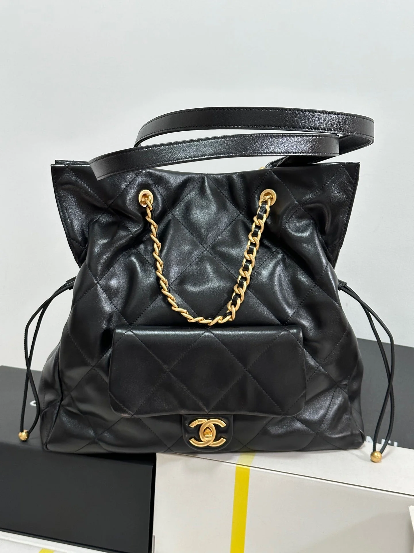 CHANEL 25C Drawstring Backpack Black Lambskin Gold Hardware 243655