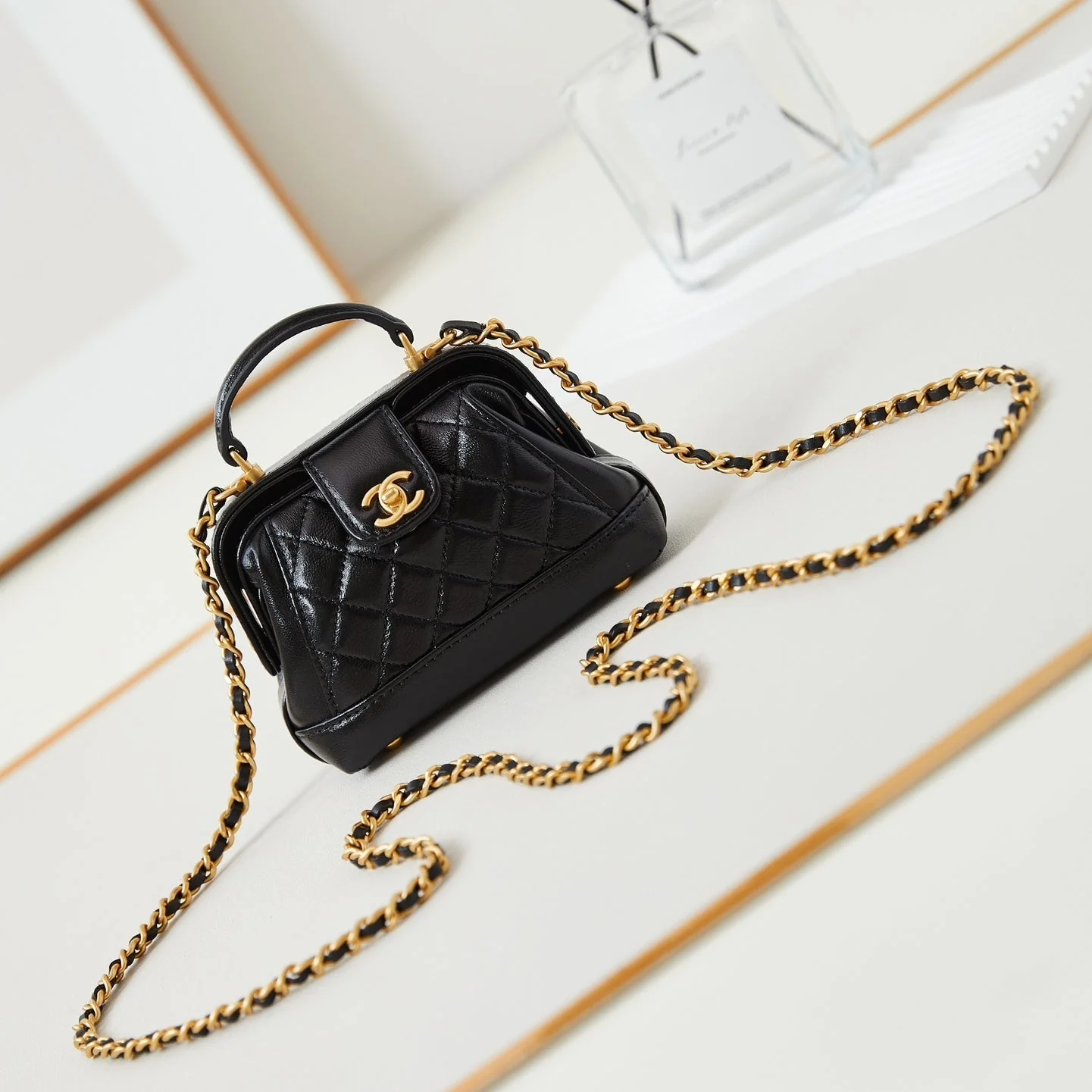CHANEL 24A Mini Top Handle 13cm Black Wax Leather Gold Hardware 238455