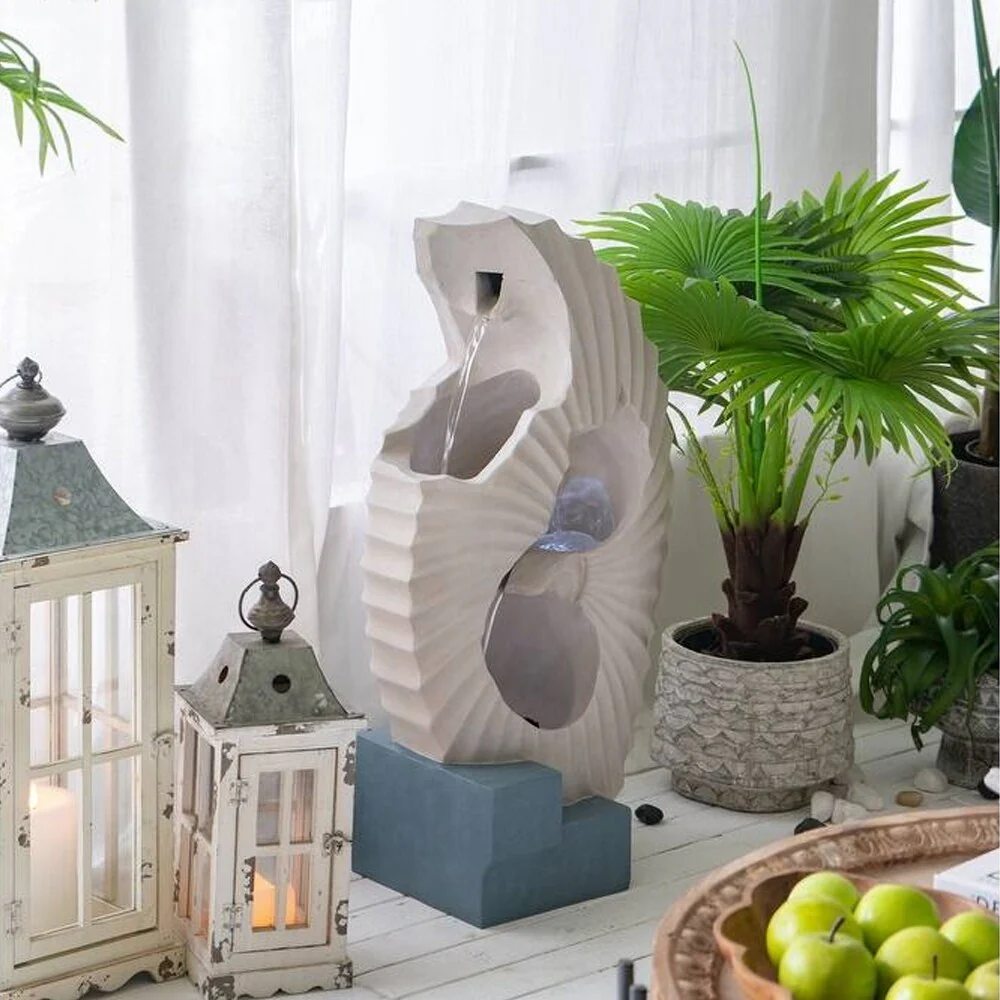 White Abstract Water Fountain with Blue Base with Light