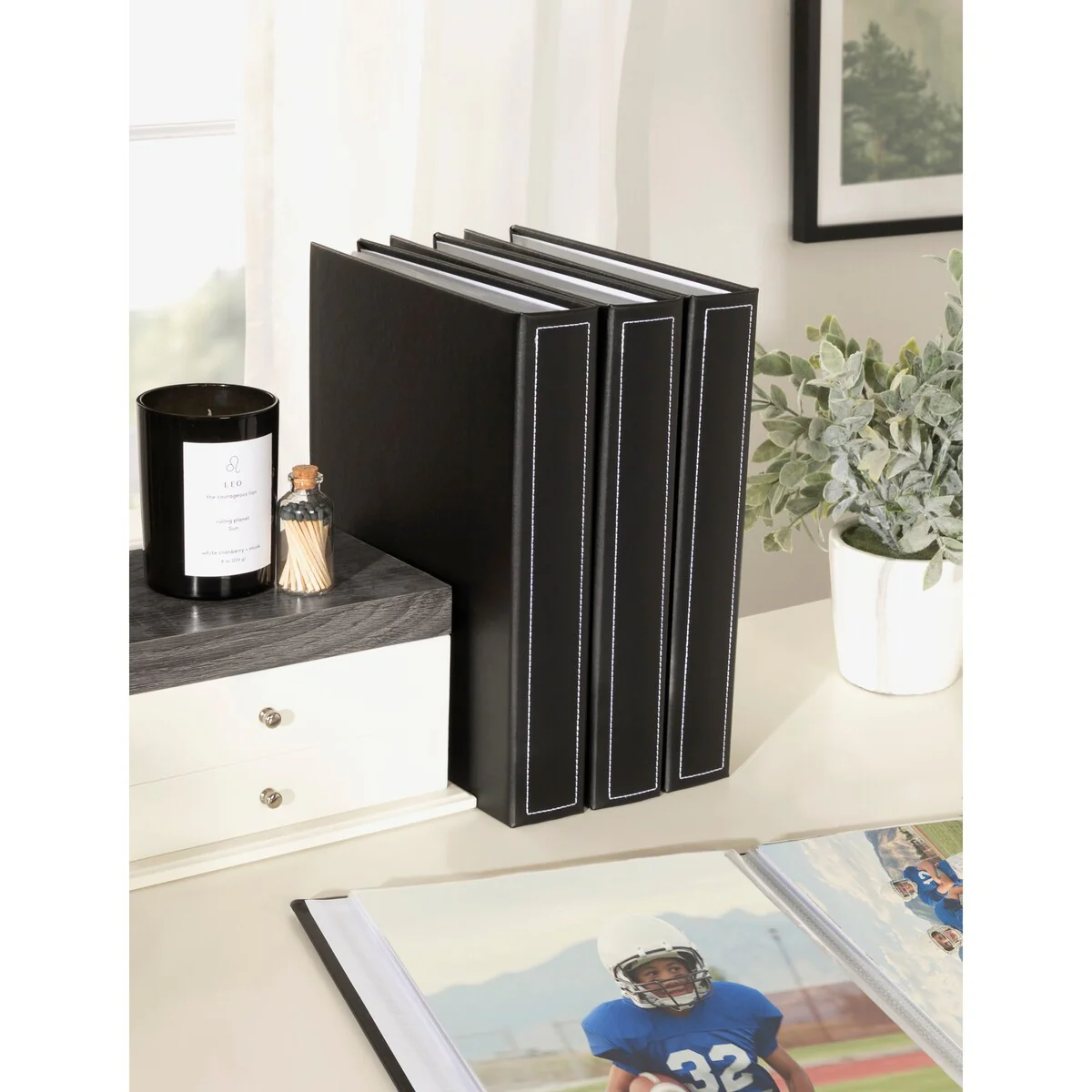DesignOvation Debossed Black Faux Leather Photo Album (Pack of 4)