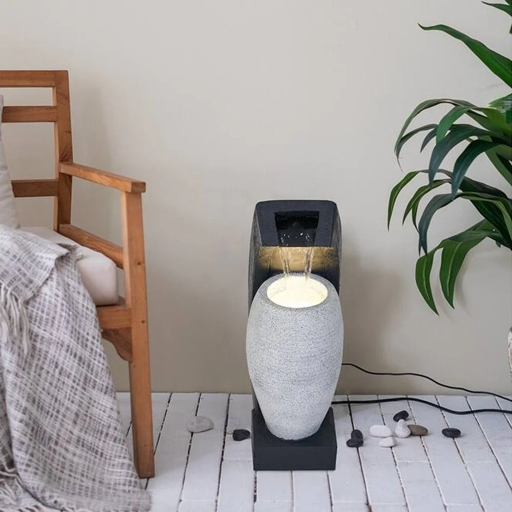 Black and White Water Fountain with Vase Design