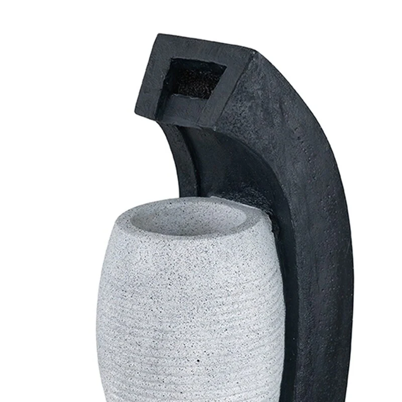 Black and White Water Fountain with Vase Design