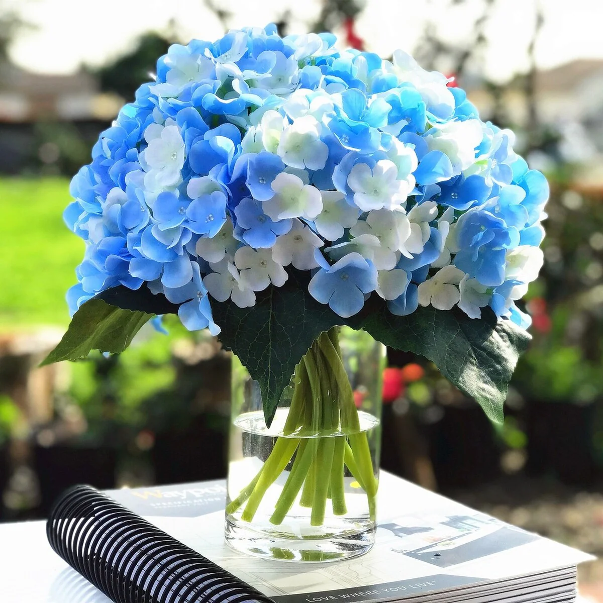Enova Home Blue Cream Artificial Silk Hydrangea Fake Flowers Arrangement in Clear Glass Vase with Faux Water for Home Decoration