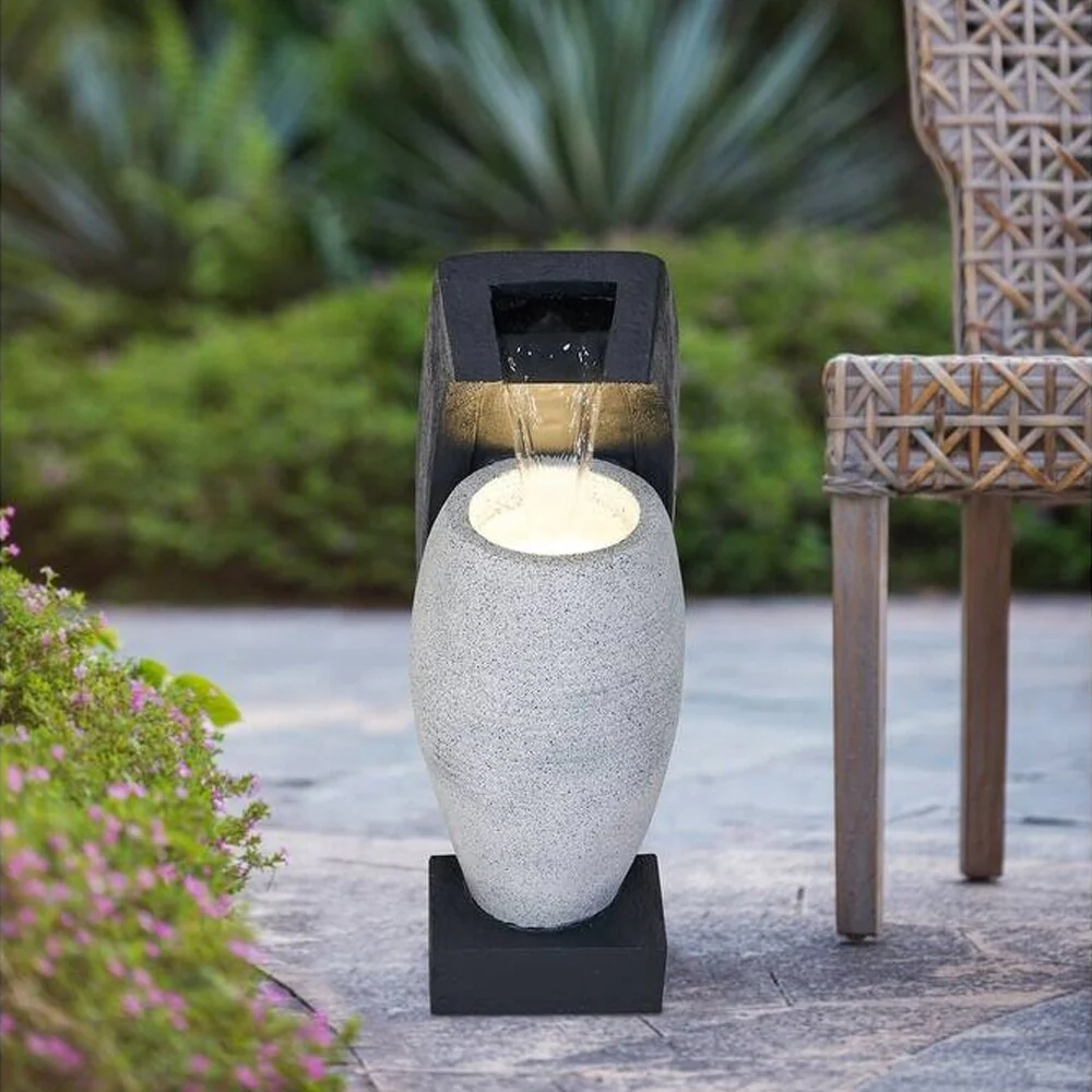 Black and White Water Fountain with Vase Design