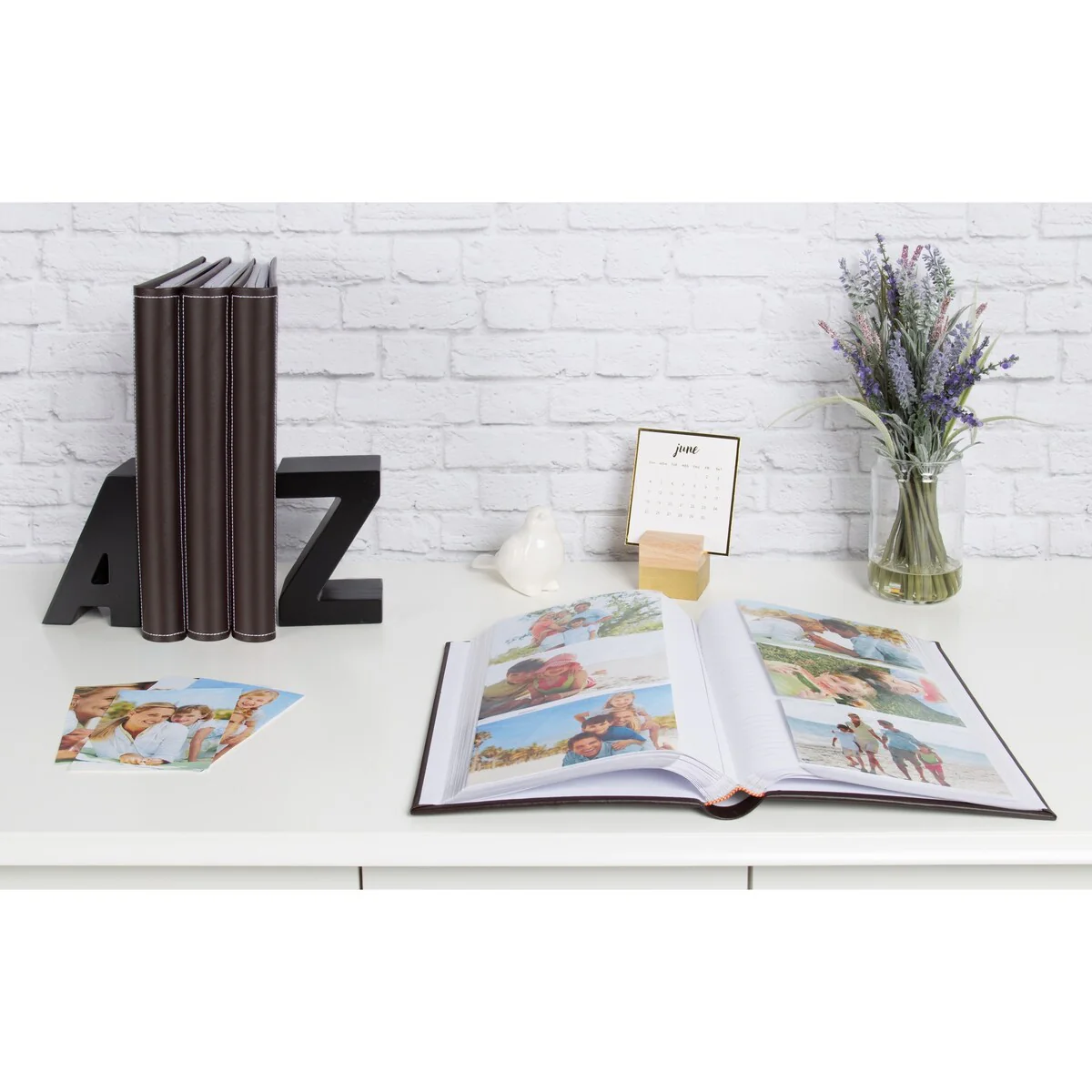 DesignOvation Debossed Black Faux Leather Photo Album (Pack of 4)