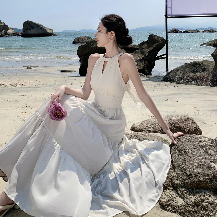 2025 Sanya holiday style neck lace-up dress women's summer seaside photo clothes super fairy beautiful cream apricot dress - Deanwangkt