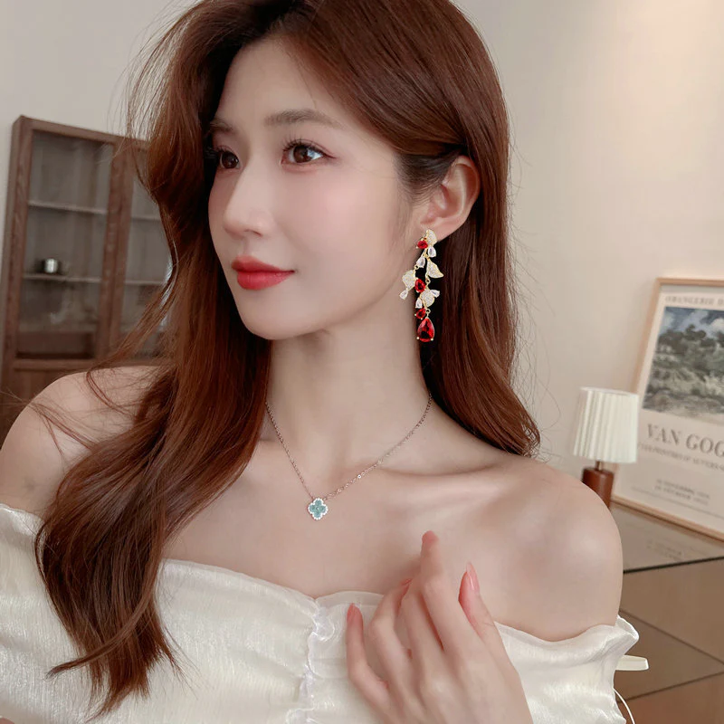 2025 fashion geometric water drop zircon leaf earrings women's s925 silver needle niche high-end banquet dress earrings - Deanwangkt