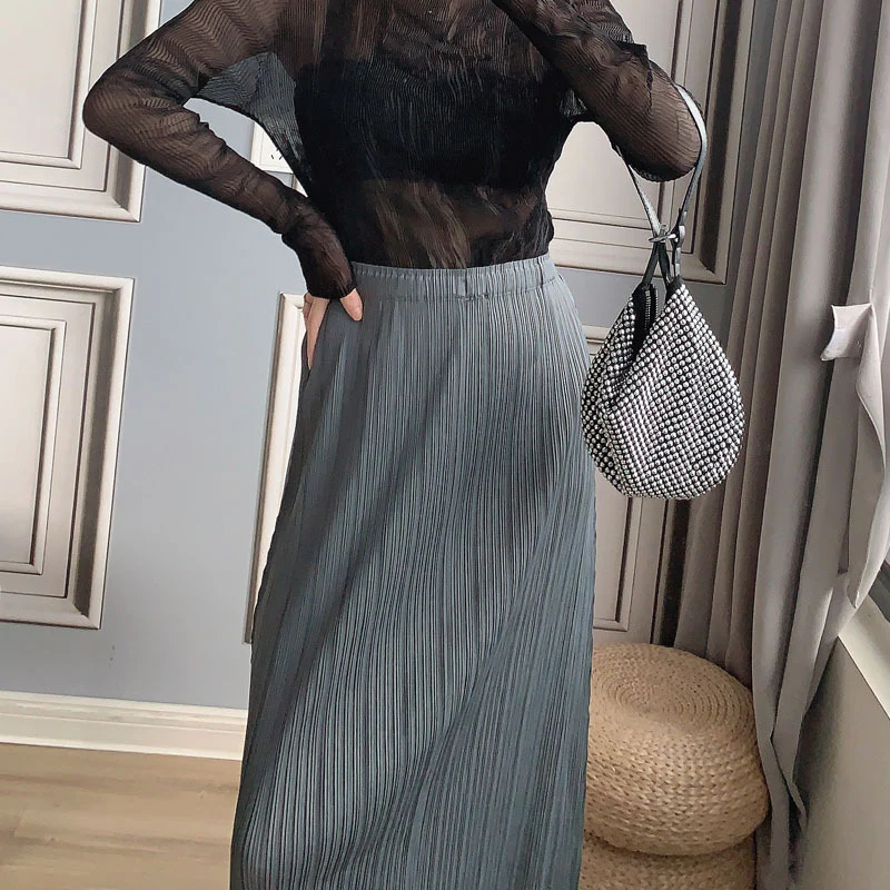 2025 Miyake hot-selling long hip-wrapped skirt with split ends and high waist, casual professional temperament, small A-shaped thin skirt, long skirt. - Deanwangkt