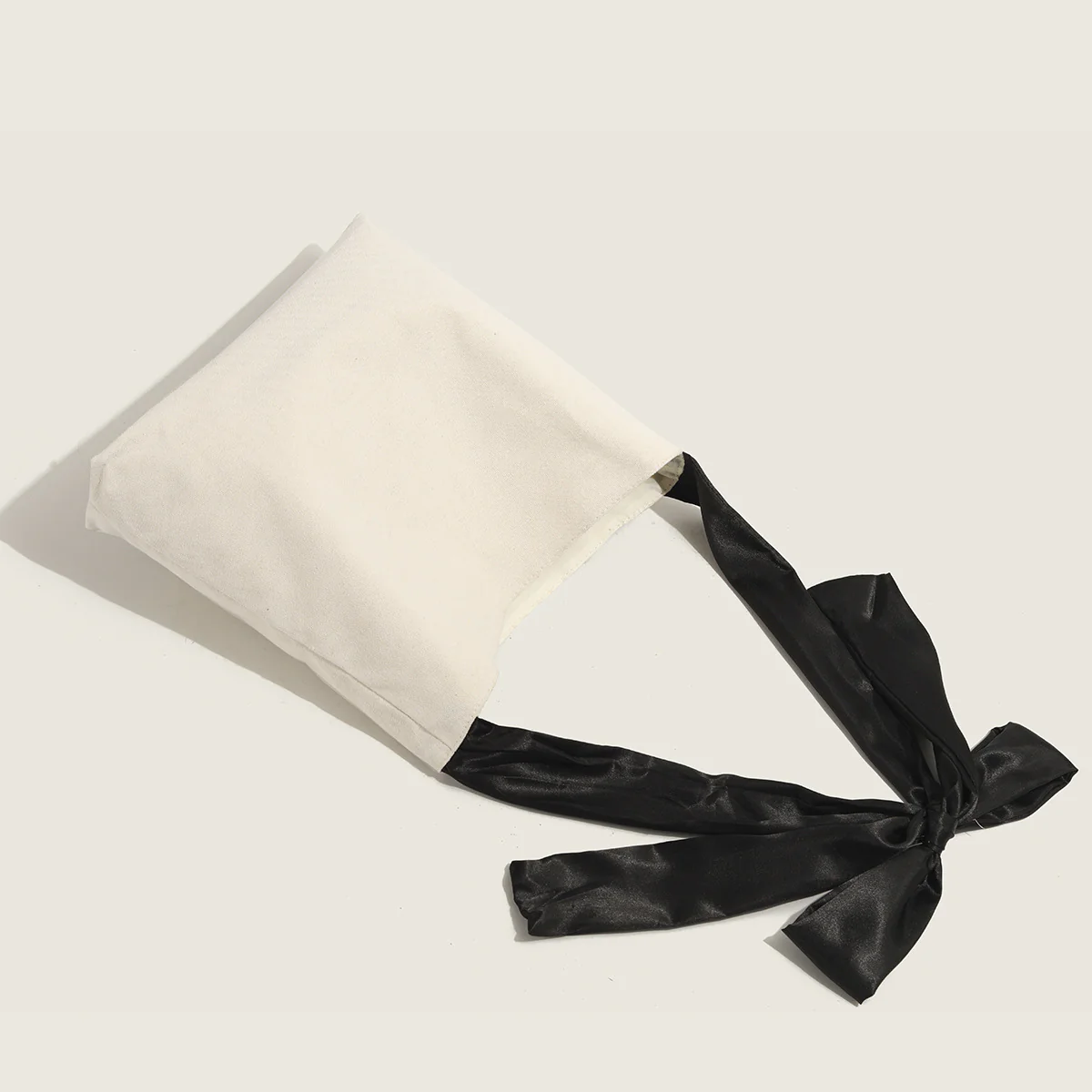 DEANWANGKT 2025 Simple niche new girl bow portable canvas bag large capacity shopping bag shoulder tote bag underarm bag - Deanwangkt