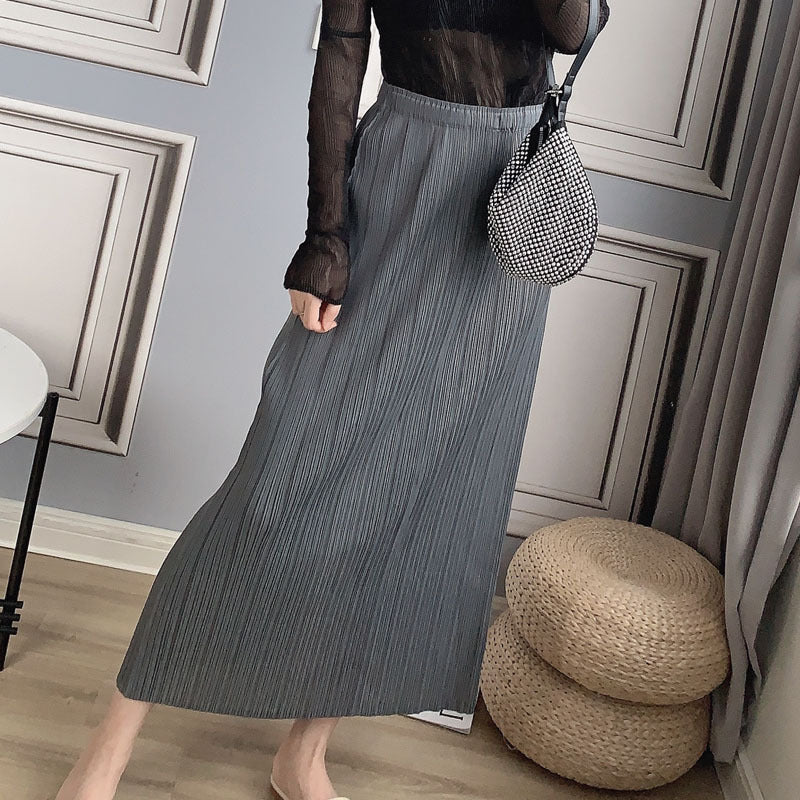 2025 Miyake hot-selling long hip-wrapped skirt with split ends and high waist, casual professional temperament, small A-shaped thin skirt, long skirt. - Deanwangkt