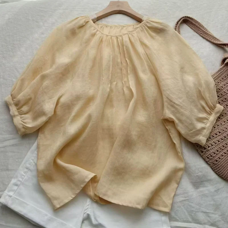 Age-reducing doll collar bubble sleeve milk yellow shirt women's  summer new temperament solid color simple loose top - Deanwangkt