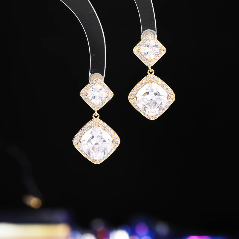 2025 Bright super flash geometric rhombus square earrings women's commuting zircon inlaid niche temperament high-end earrings wholesale - Deanwangkt