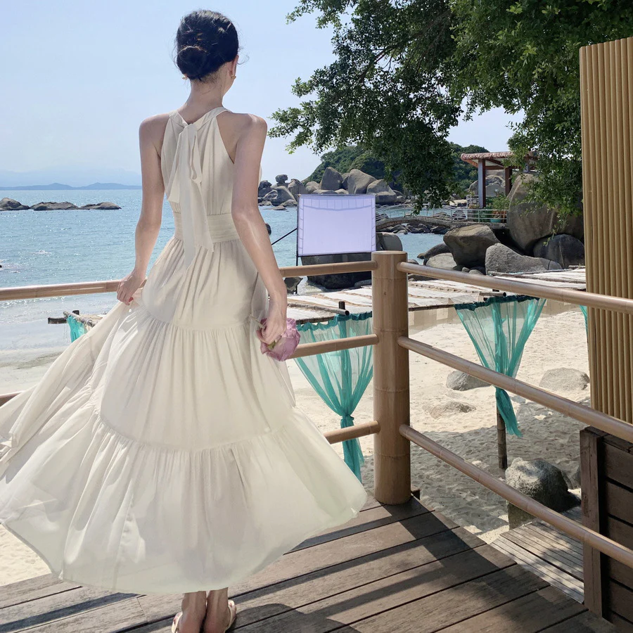 2025 Sanya holiday style neck lace-up dress women's summer seaside photo clothes super fairy beautiful cream apricot dress - Deanwangkt