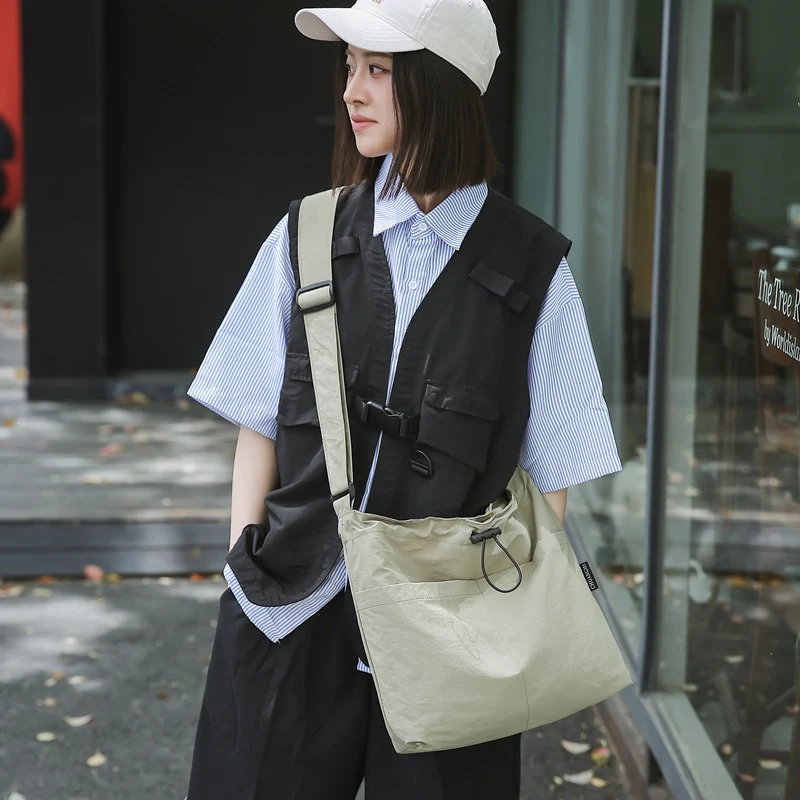 DEANWANGKT 2025 Korean version of fashion nylon shoulder bag popular new casual drawstring canvas messenger bag large capacity men's and women's tote bag - Deanwangkt