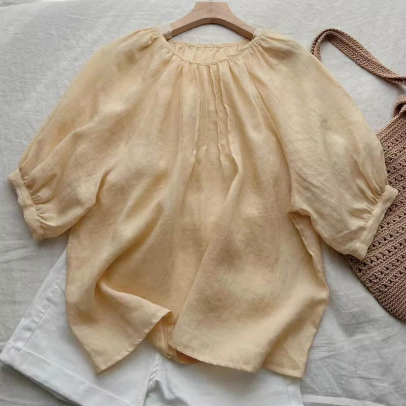 Age-reducing doll collar bubble sleeve milk yellow shirt women's  summer new temperament solid color simple loose top - Deanwangkt